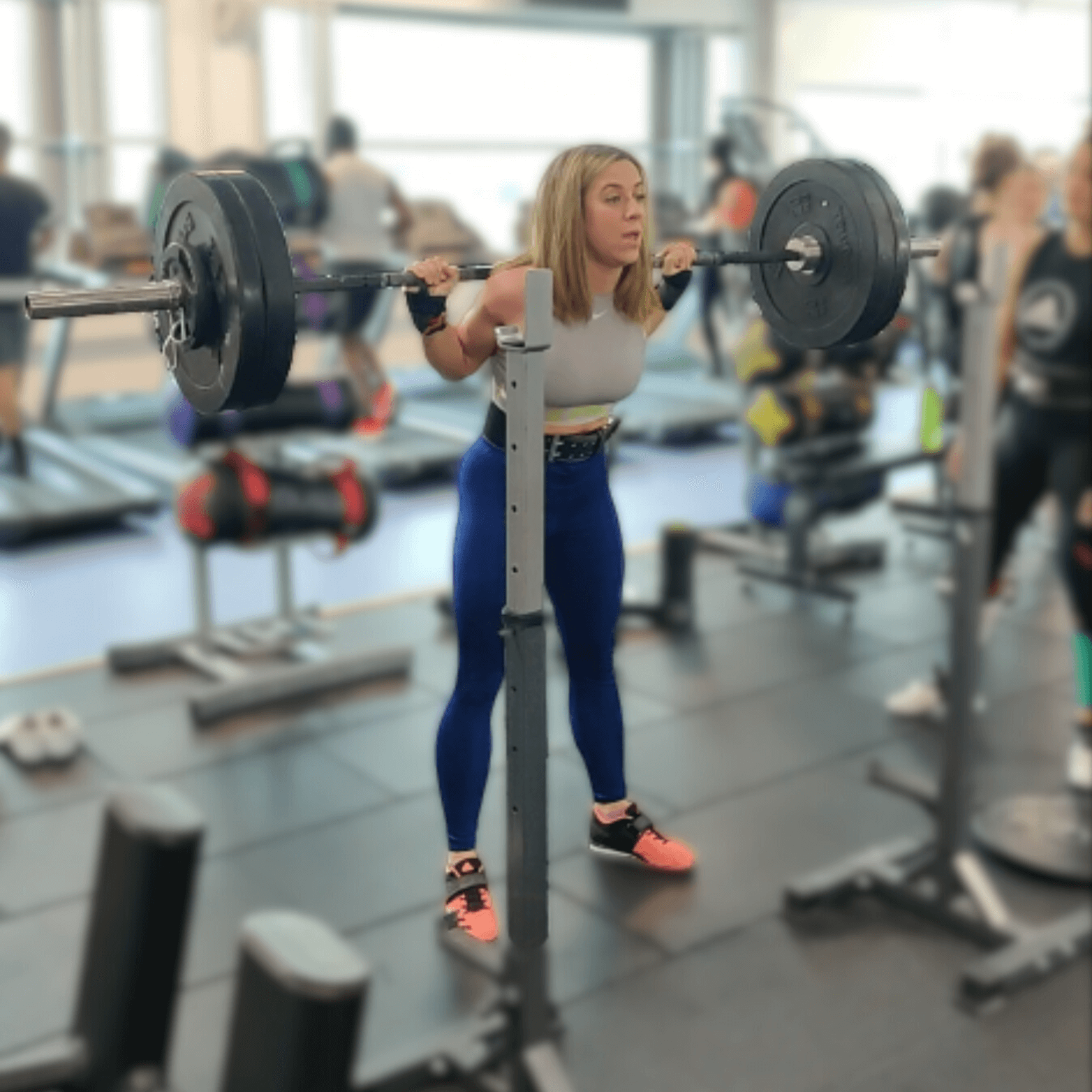 Learn to Lift Bootcamp Glasgow member preparing to squat