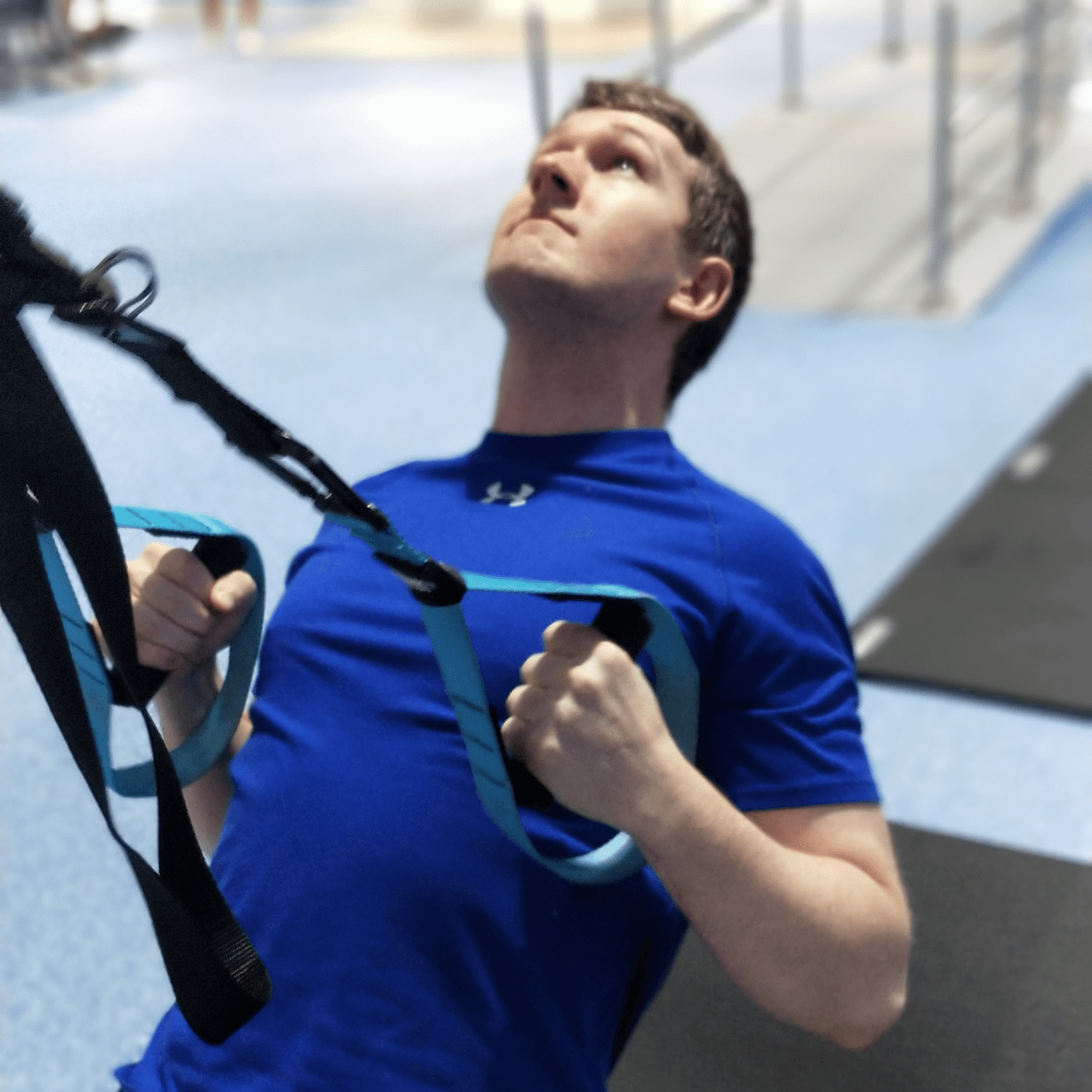 Man doing TRX rows during his Glasgow personal training session