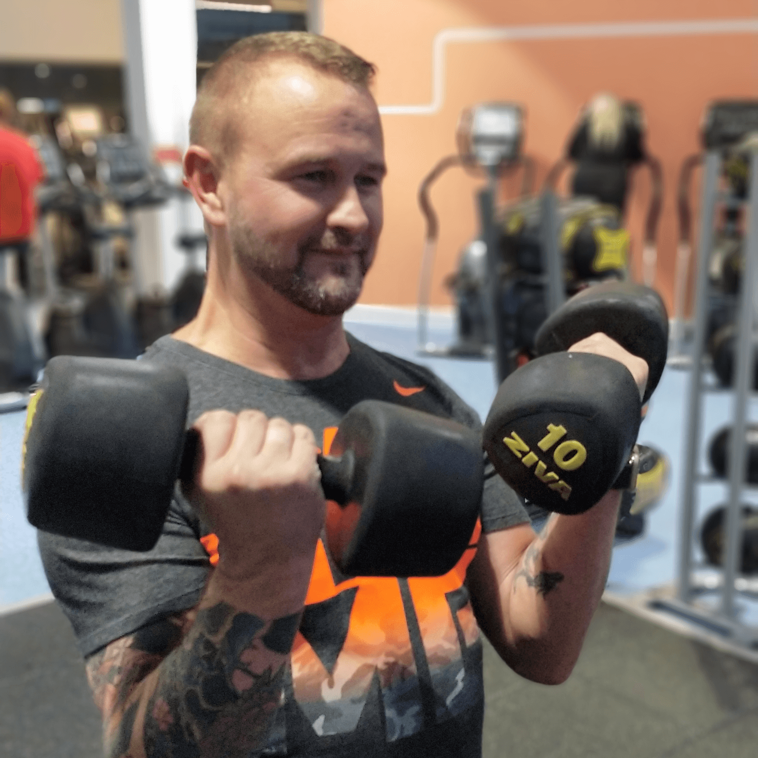 Man doing curls at Glasgow personal training session