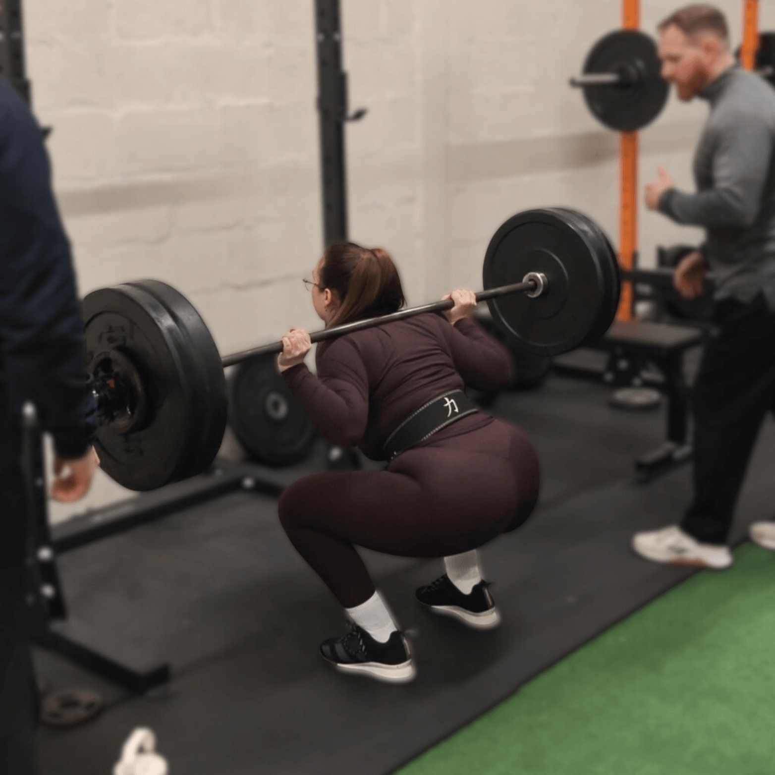 Personal training Glasgow client doing squats