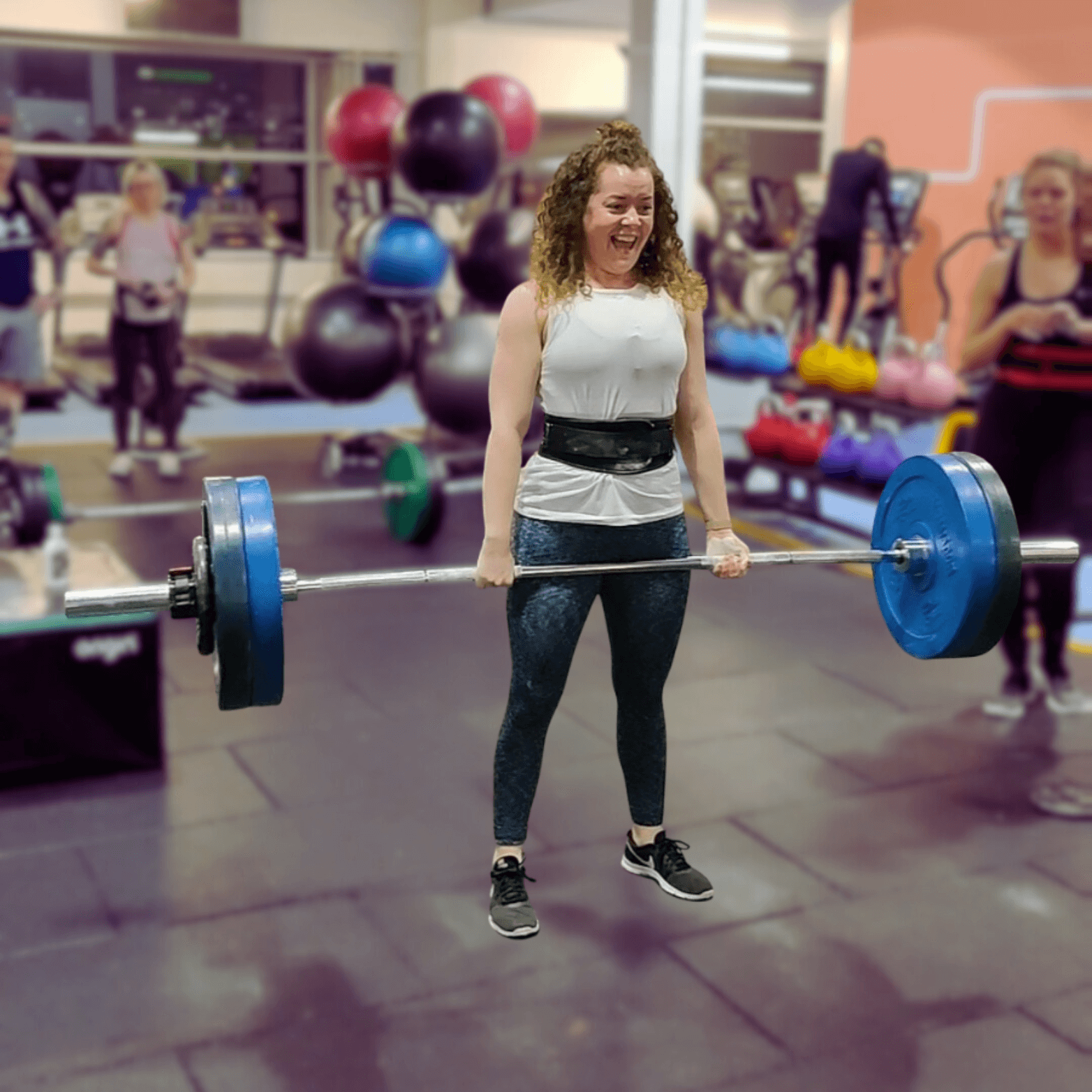 Woman hitting a deadlift PB at Learn to Lift Bootcamp in Glasgow