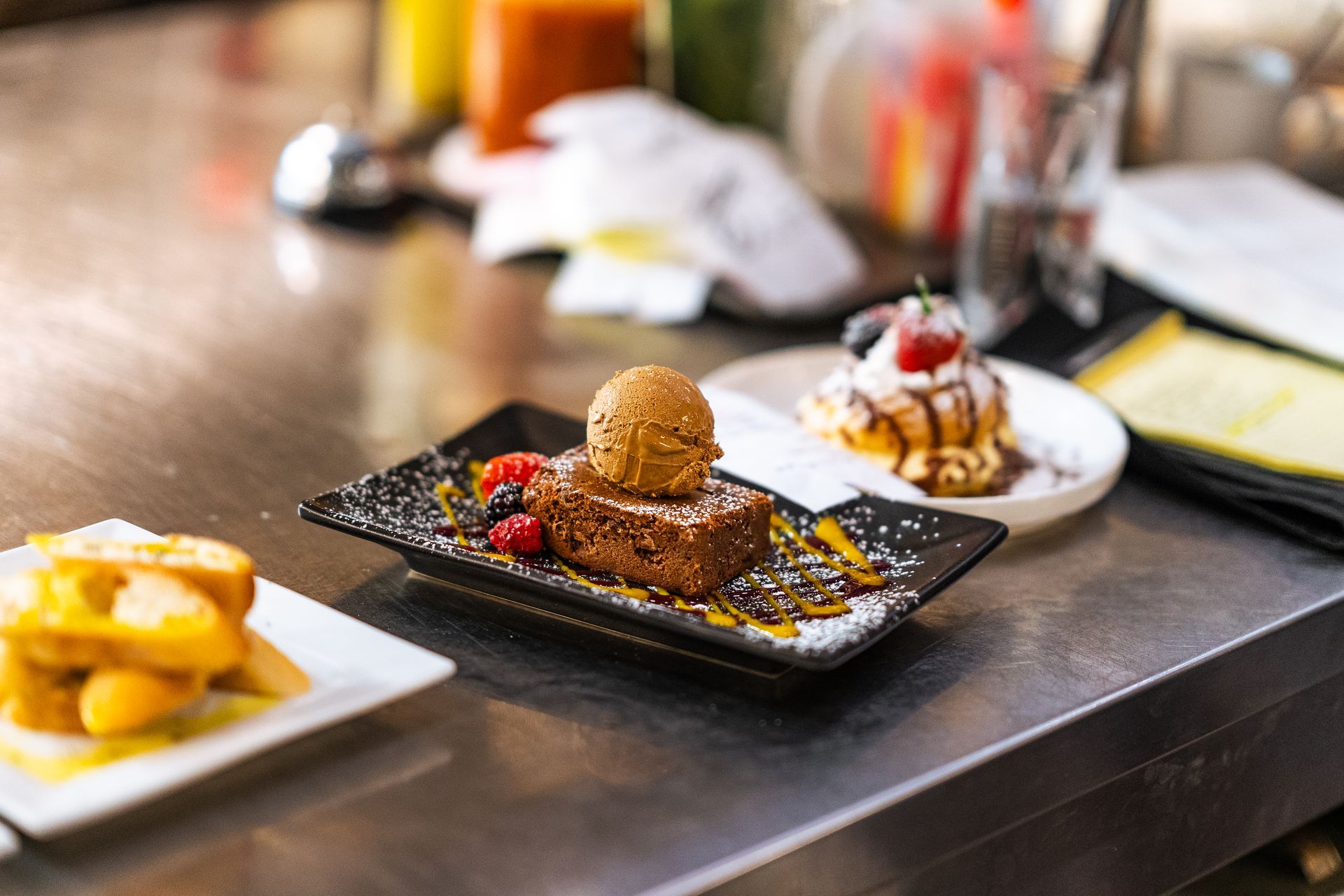 A close up of a plate of desserts on a table.