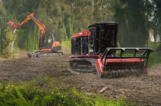 A bulldozer is moving dirt on a construction site.