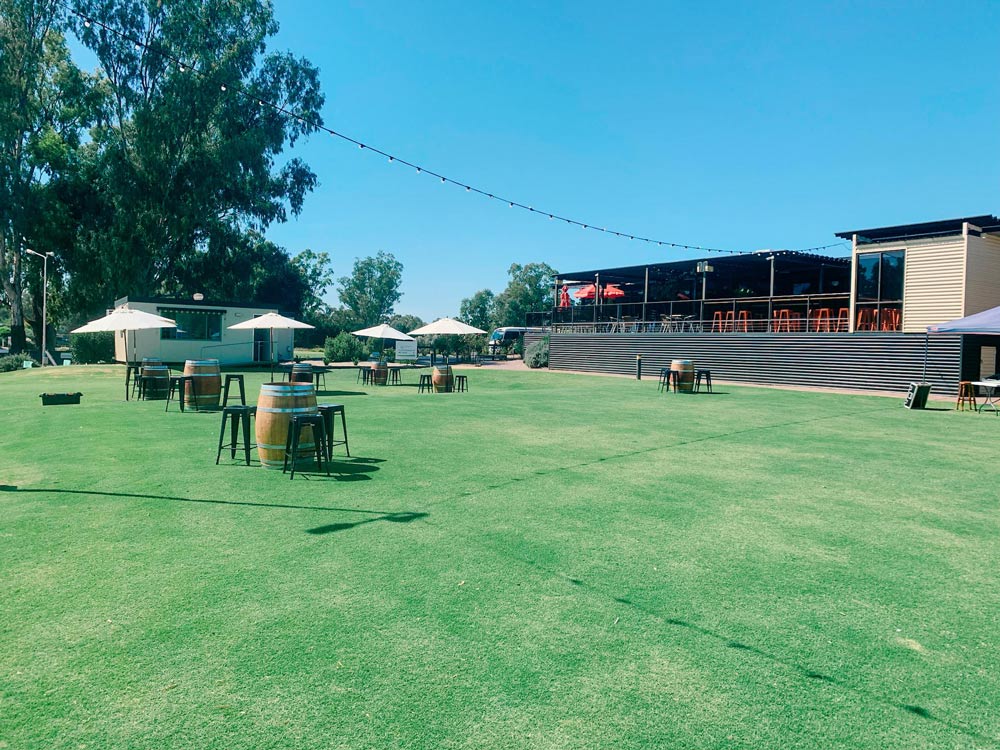 Tables and Chairs in a Lawn for Outdoor Celebration — Party Hire in Chevallum QLD