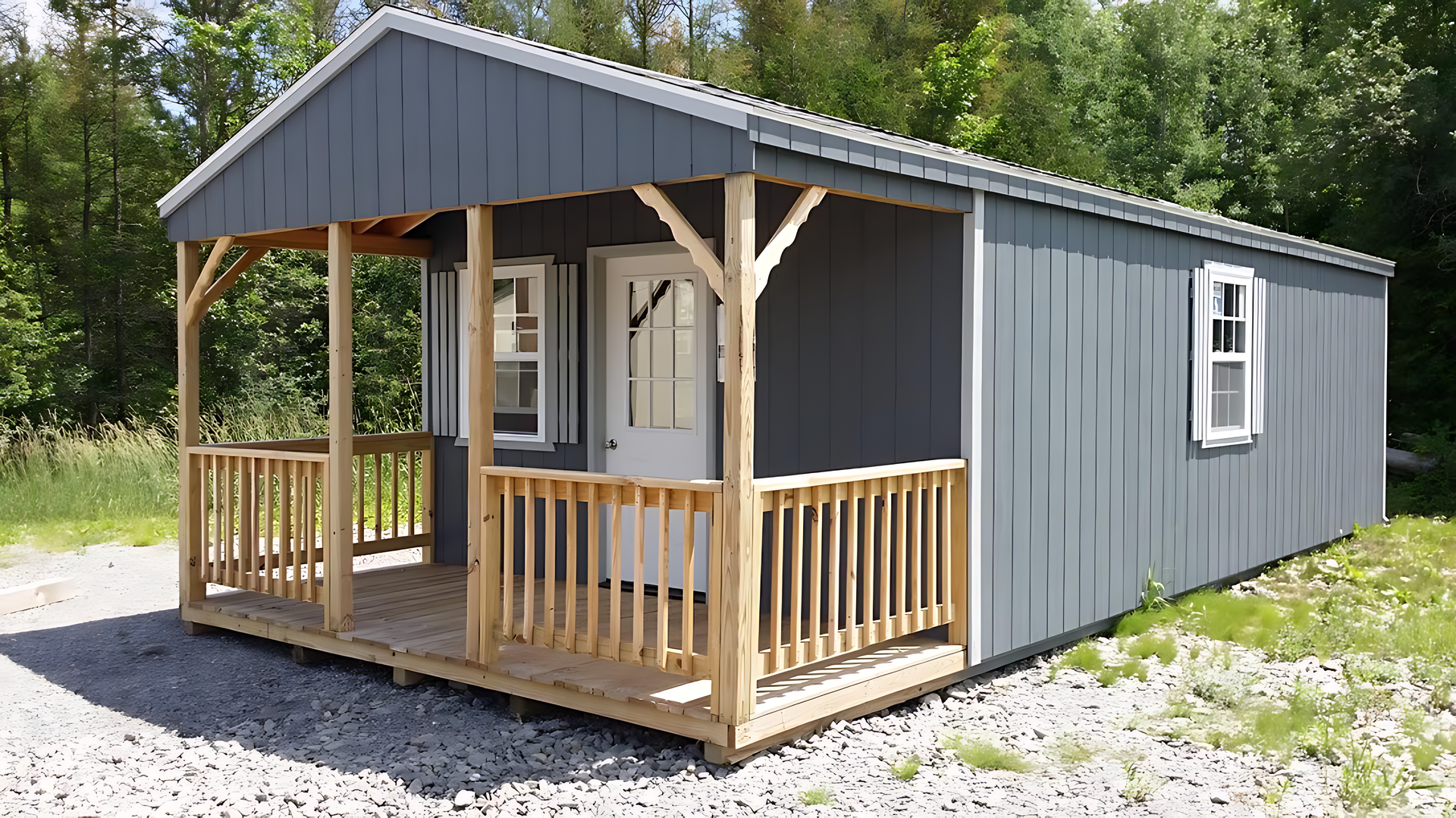A small house with a porch and a wooden railing