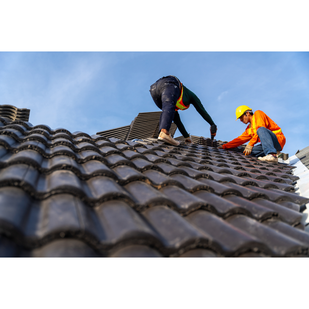 residential roofers working on a roof
