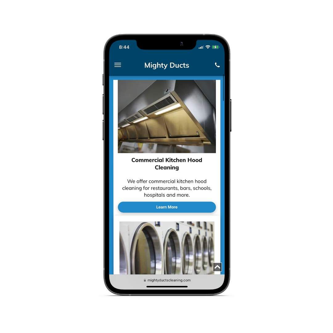 A cell phone with a picture of a kitchen hood on the screen.