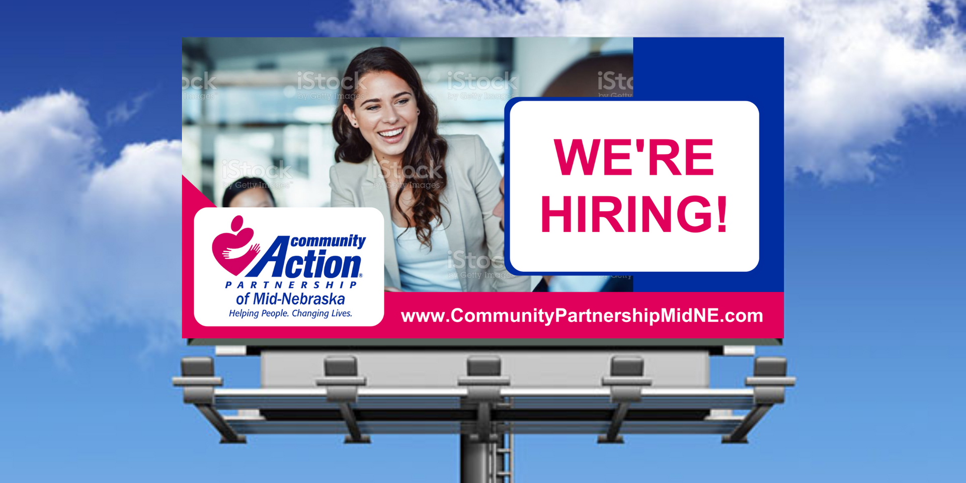 A billboard that says we 're hiring on it