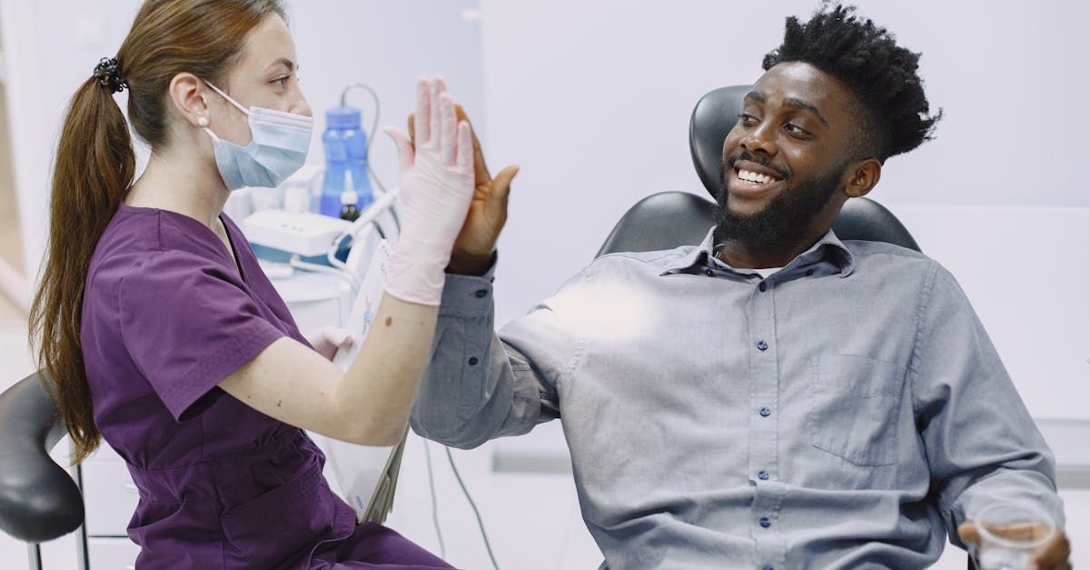 dentist giving new patient high-five