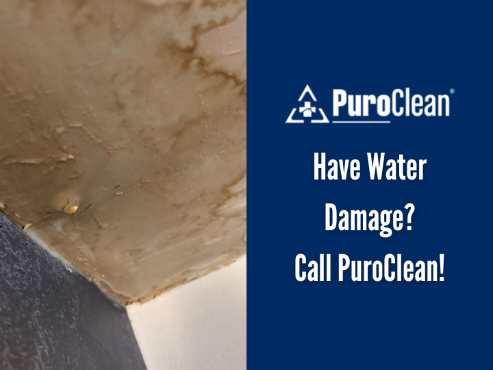 A sign that says puroclean has water damage
