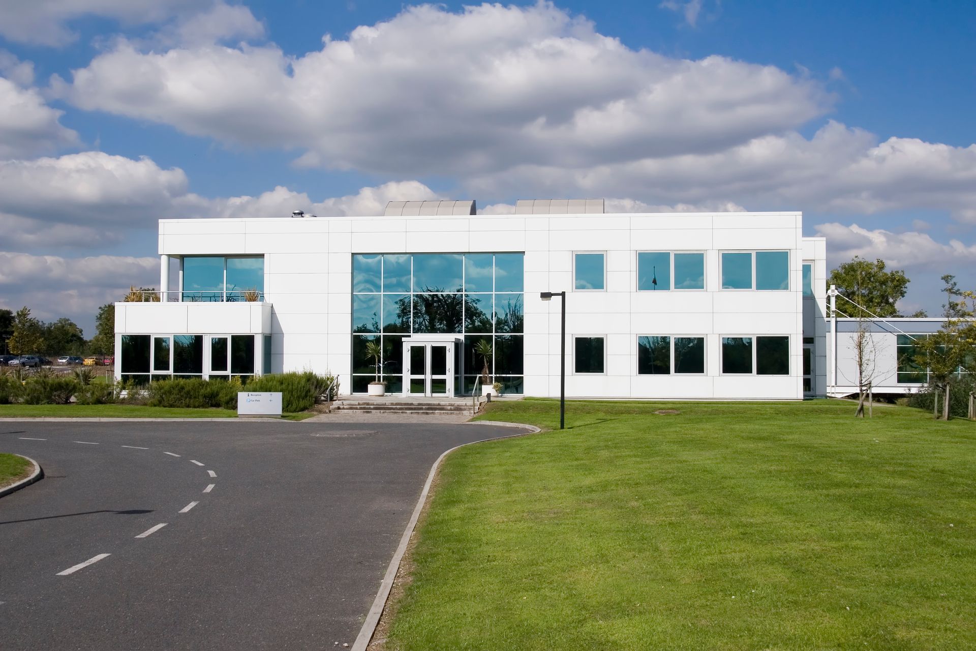 A large white building with a lot of windows