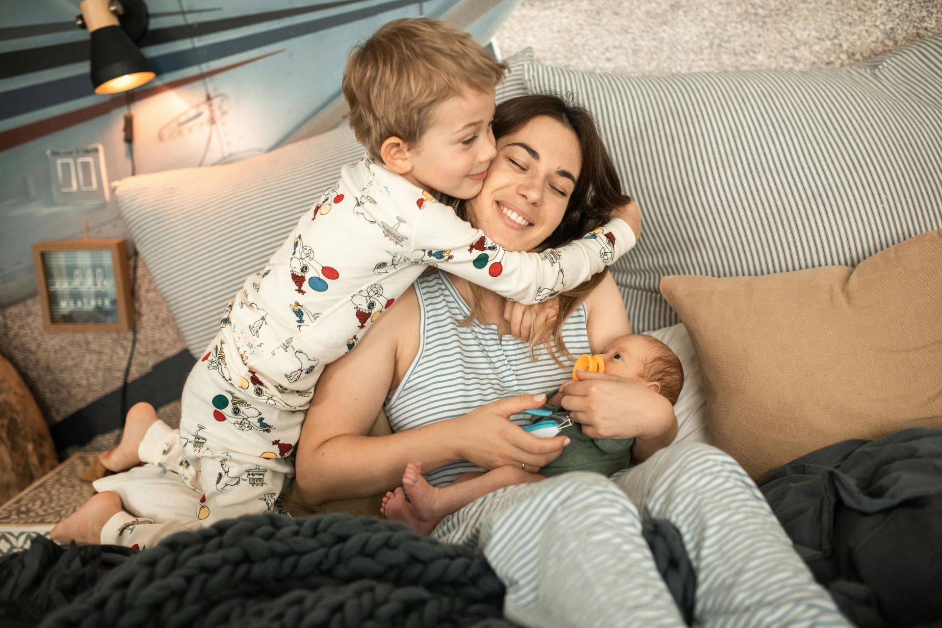 a mom with her toddler and newborn