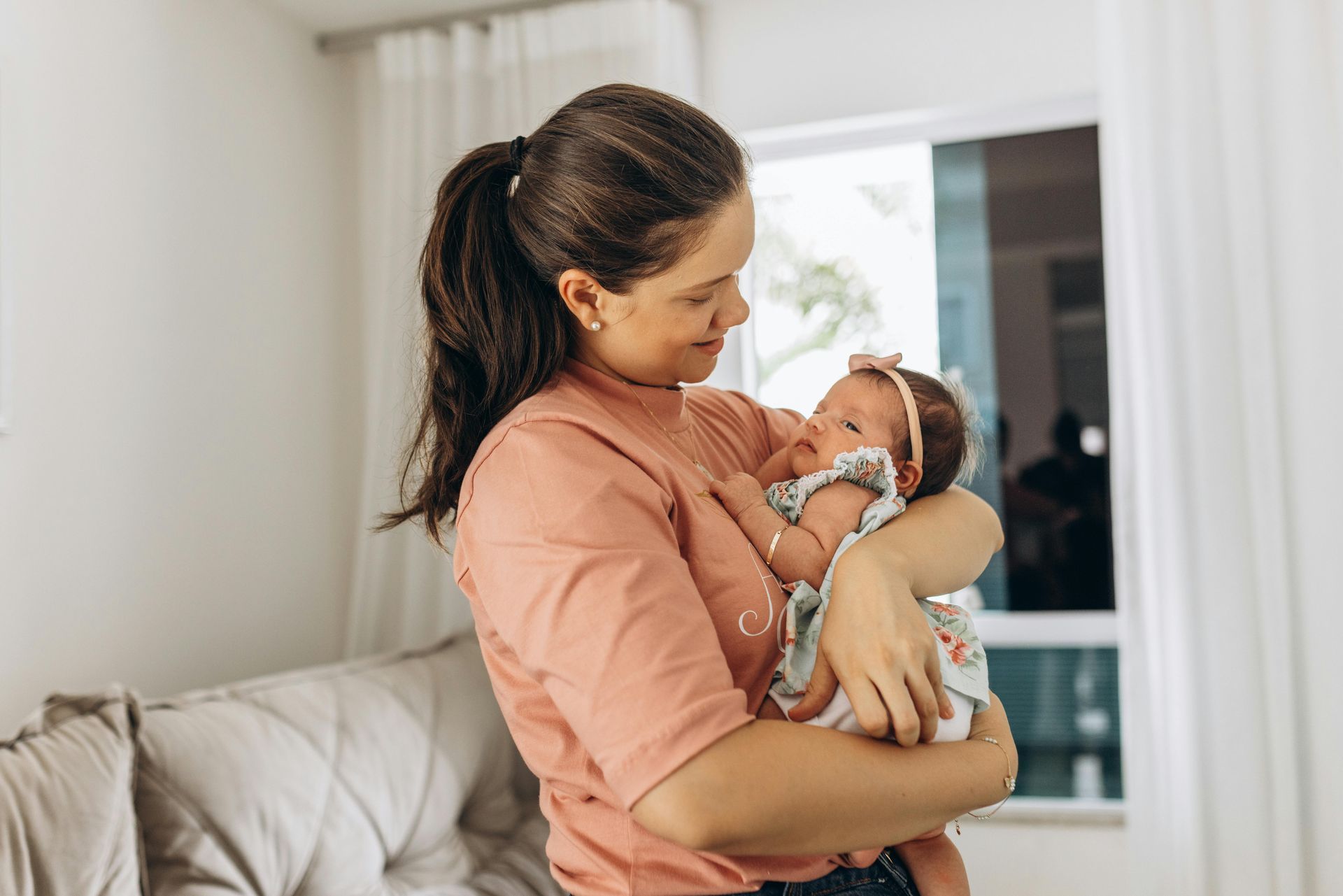 Single postpartum mom with newborn baby