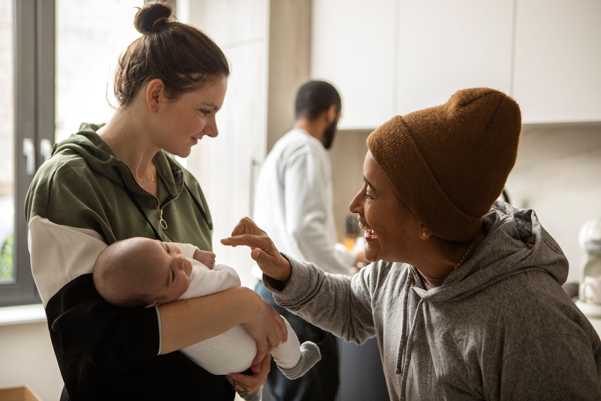 Postpartum mom with visitors