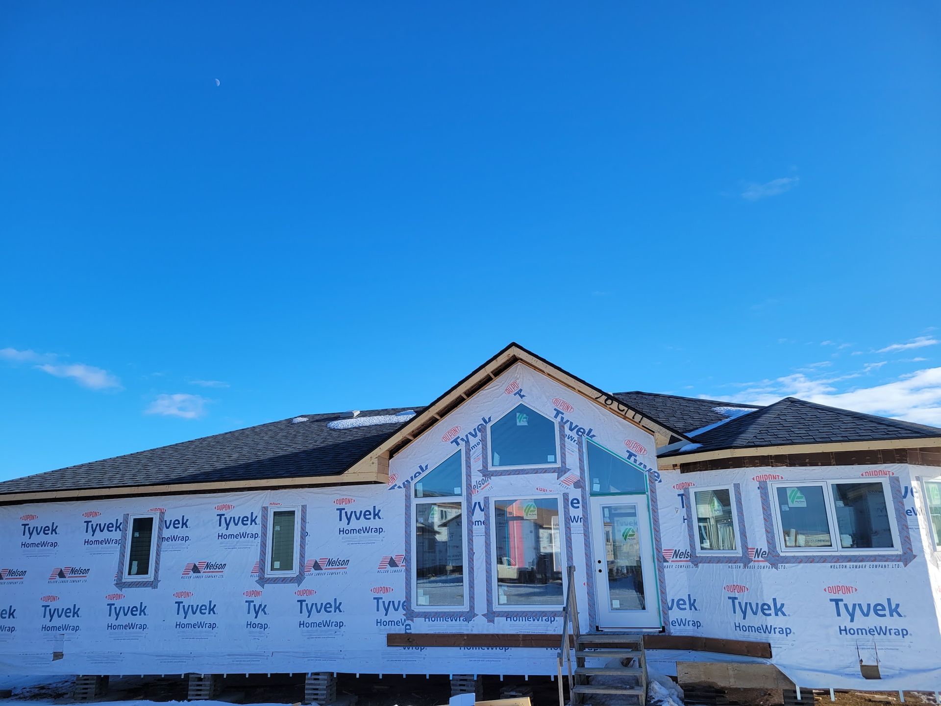 A house is being built with tyvek insulation