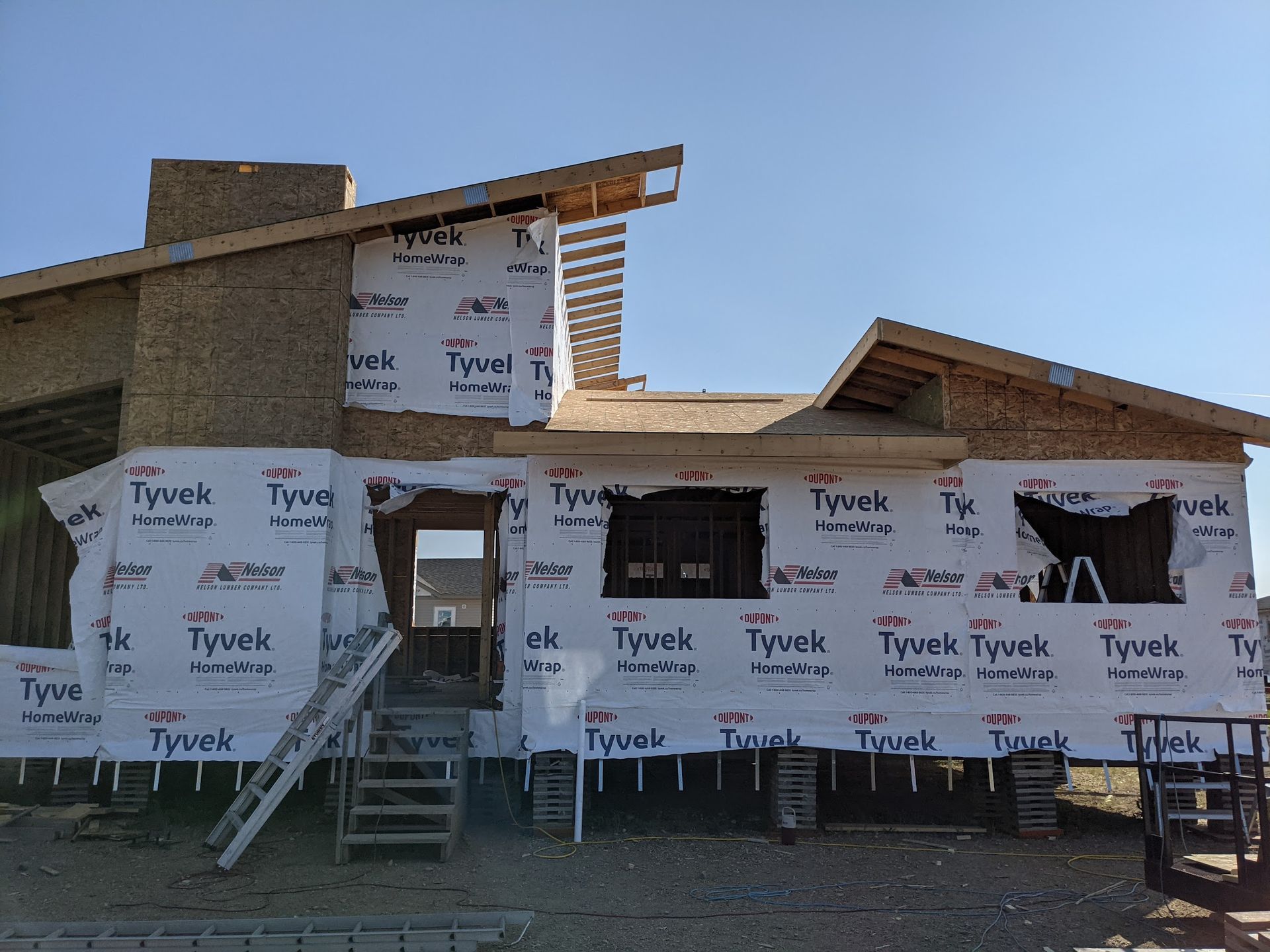 A house is being built with tyvek insulation
