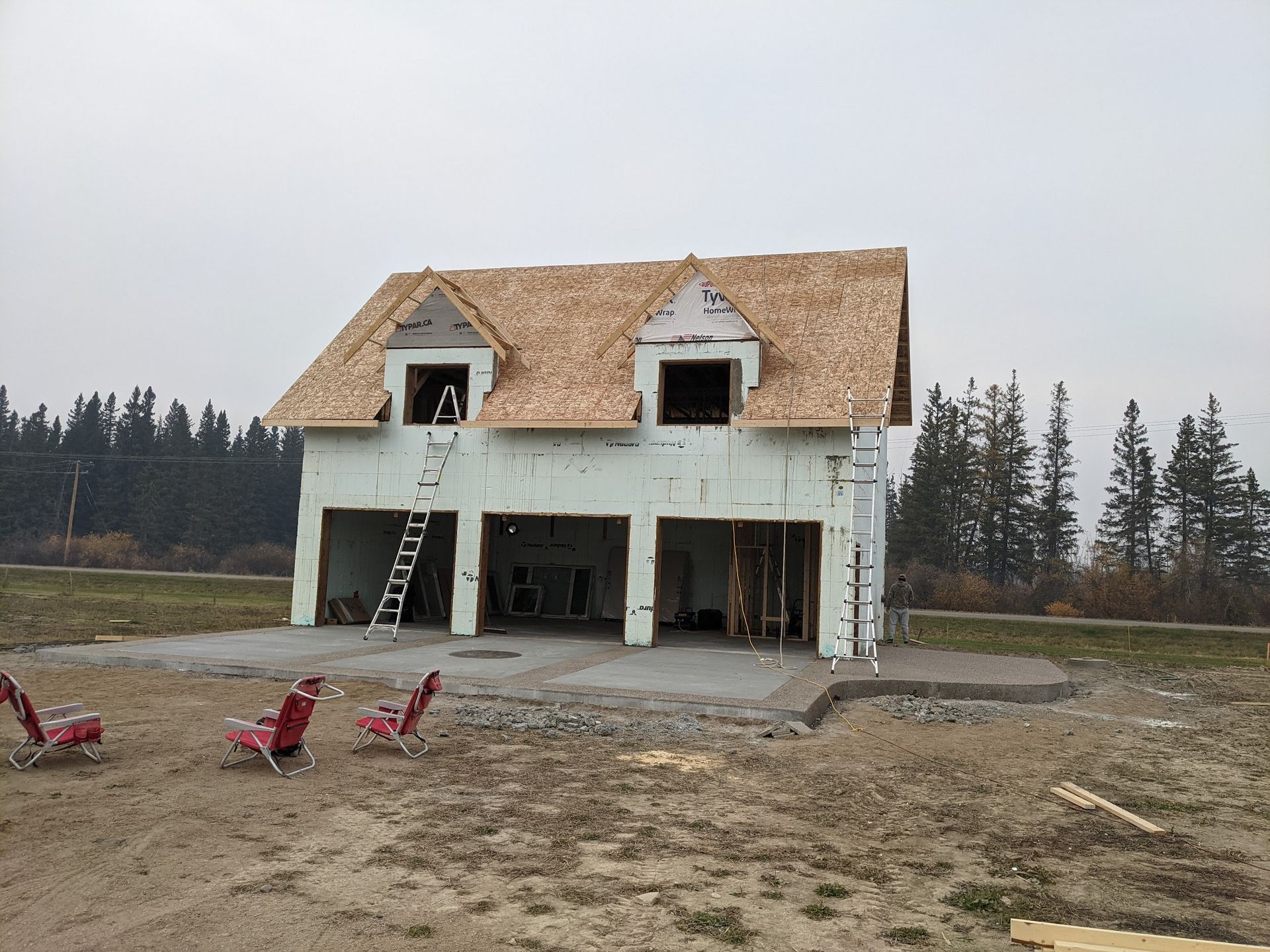 A house that is being built in a field