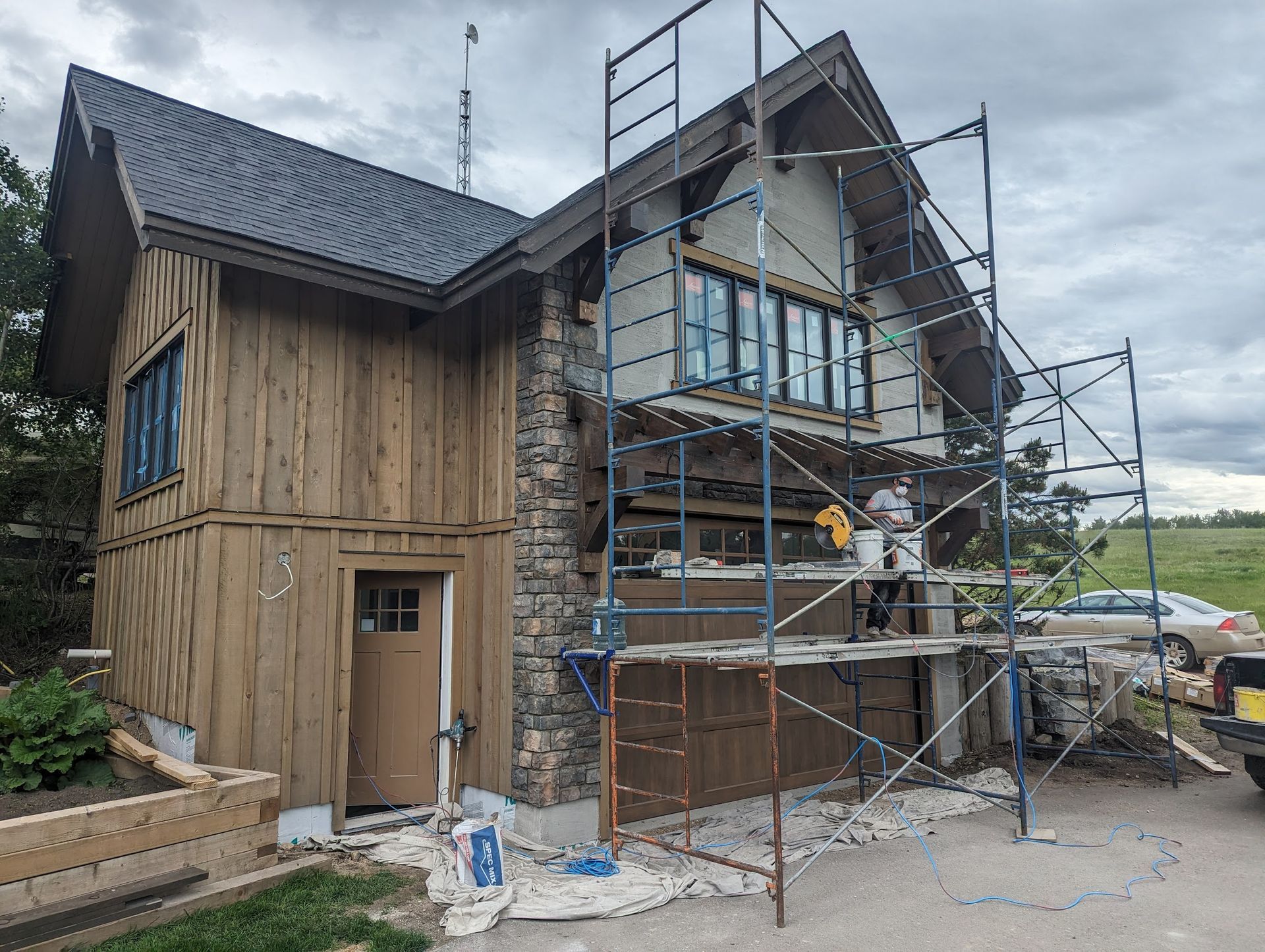 A house is being built with scaffolding around it.