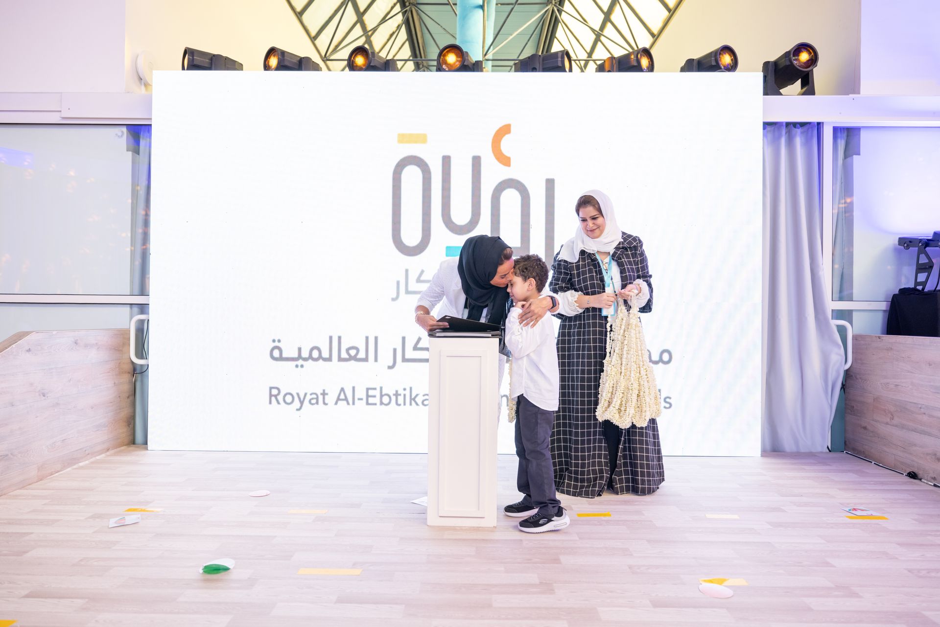 A boy receiving his certificate