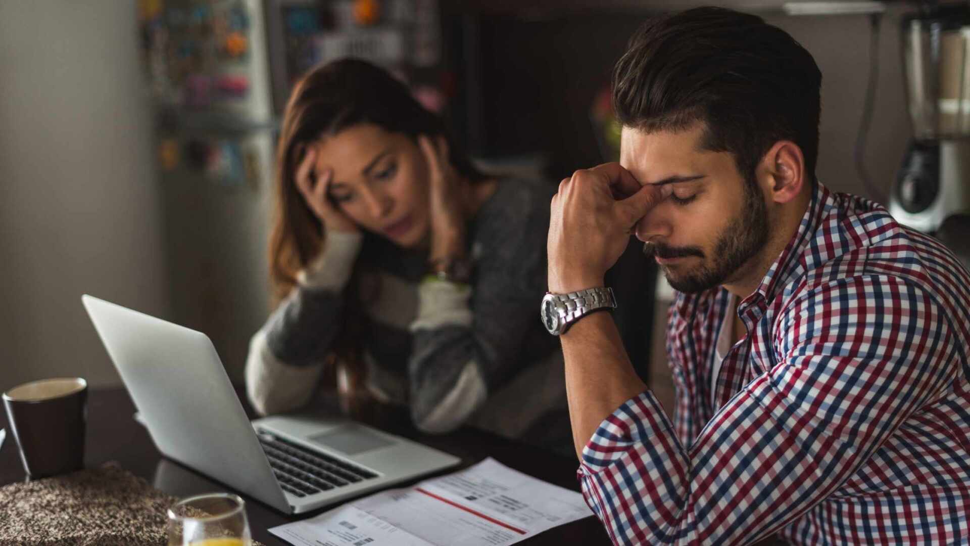 man and women both feeling worried and anxious