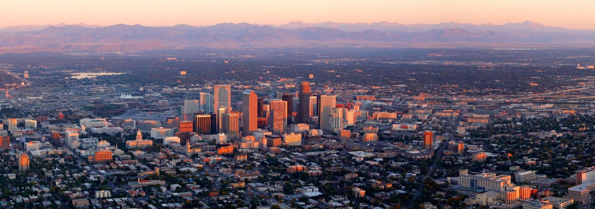 skyline of Denver, CO at sunset