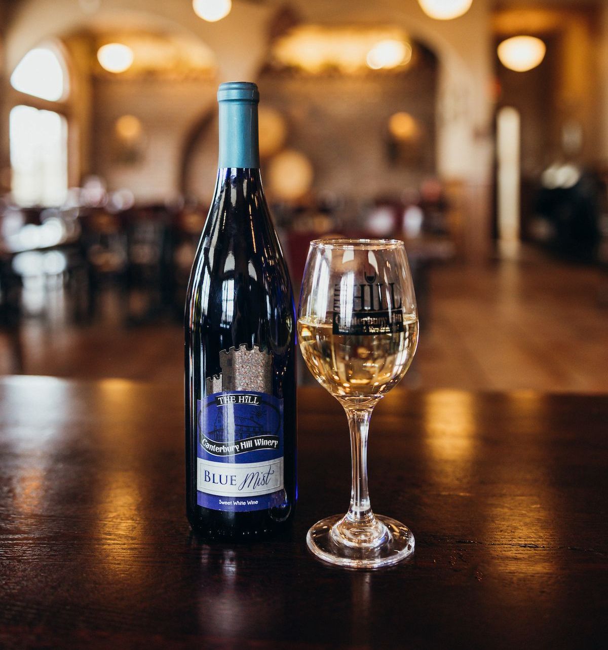 Blue Mist is a Sweet White Wine. Purchase Your Bottle or Case at the Hill in Holts Summit, MO.