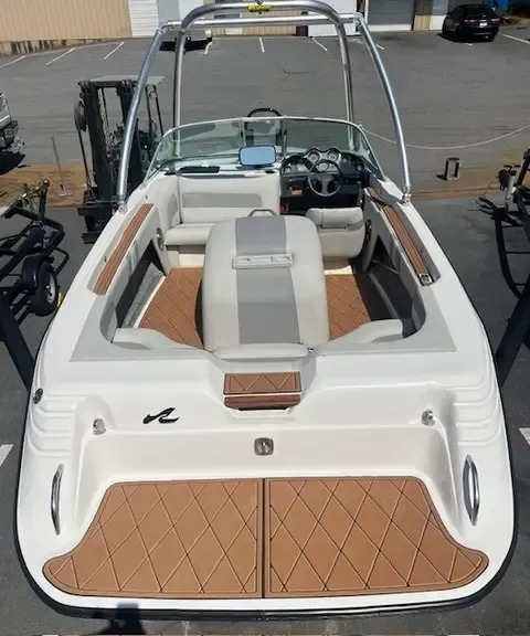 White and brown motorboat.