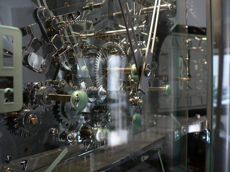 teca con meccanica orologio