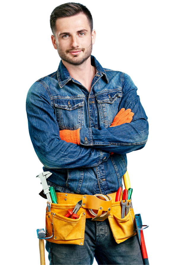 A man in a denim shirt and tool belt is standing with his arms crossed.