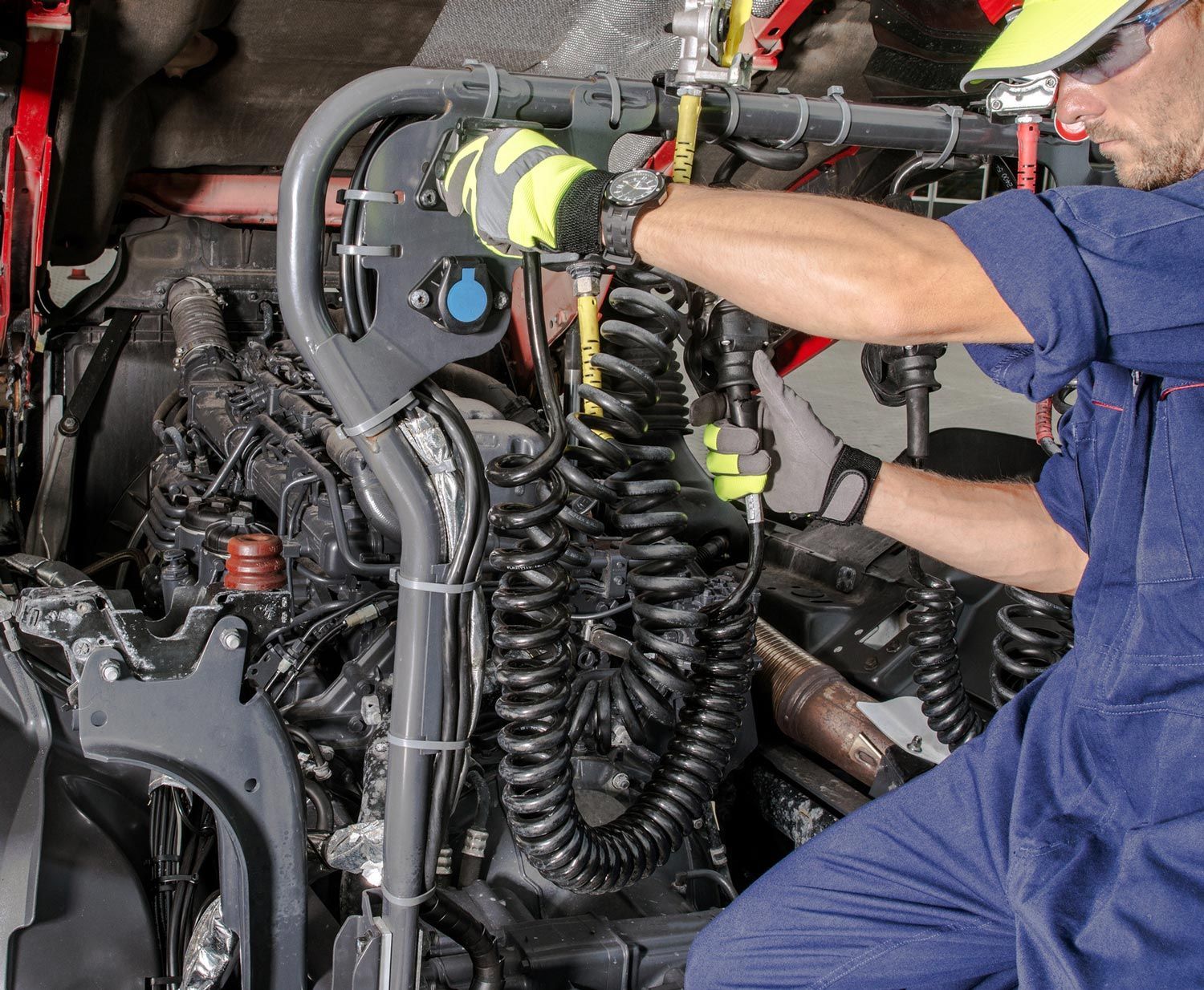 Mechanic Doing A Maintenance — Commerce City, CO — Bigfoot Diesel Parts