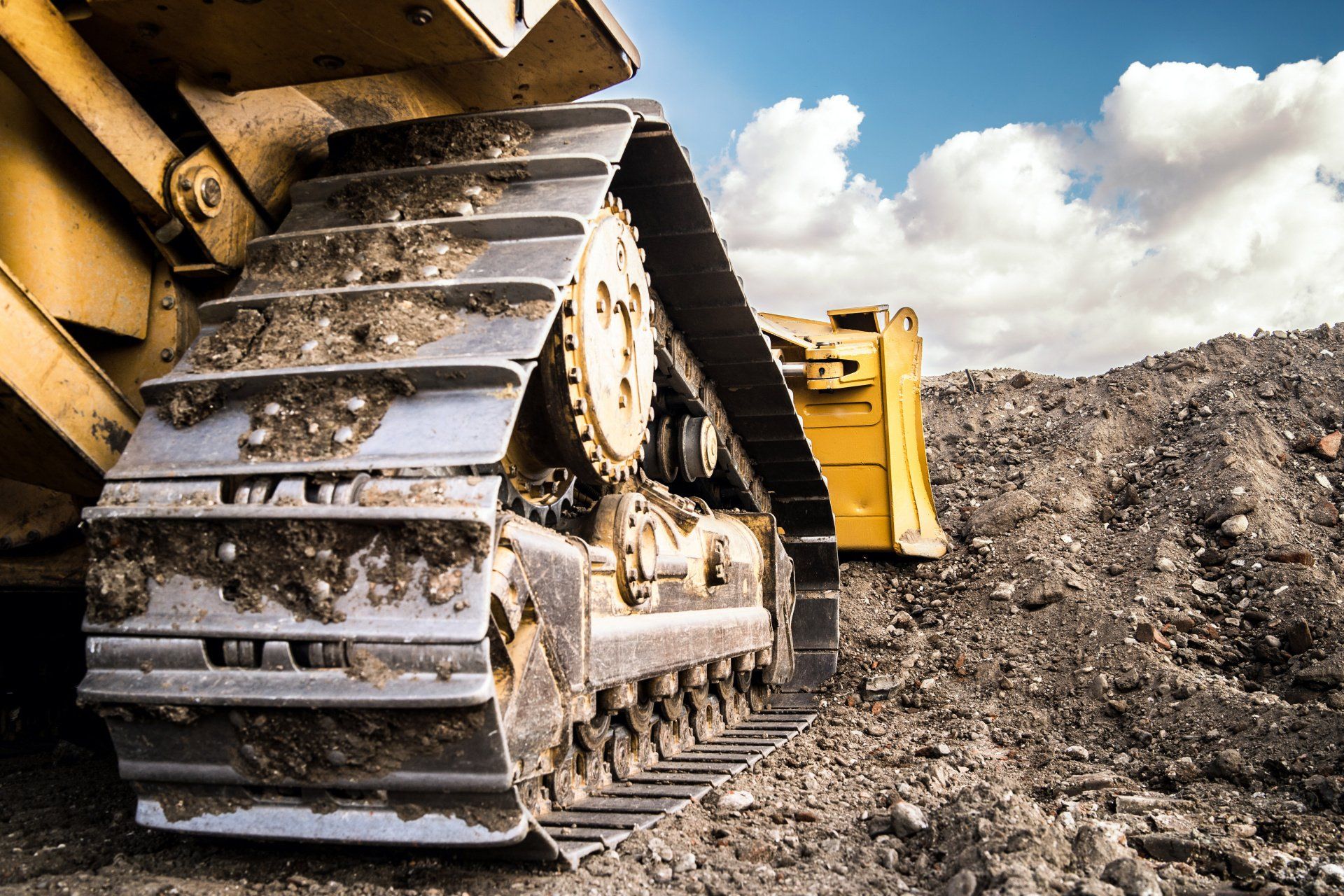 rear view of bulldozer track wheels