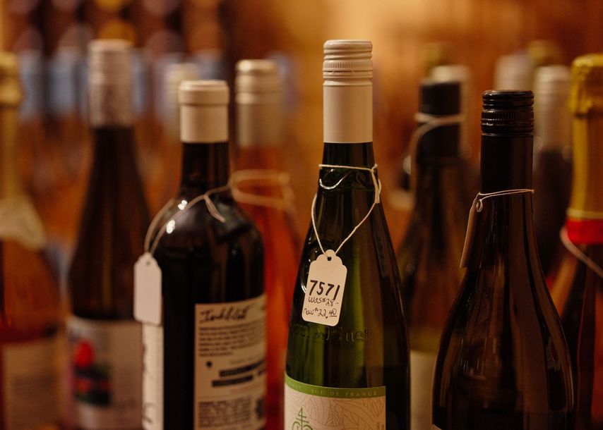 A bottle of wine with a tag that says ' 7321 ' on it
