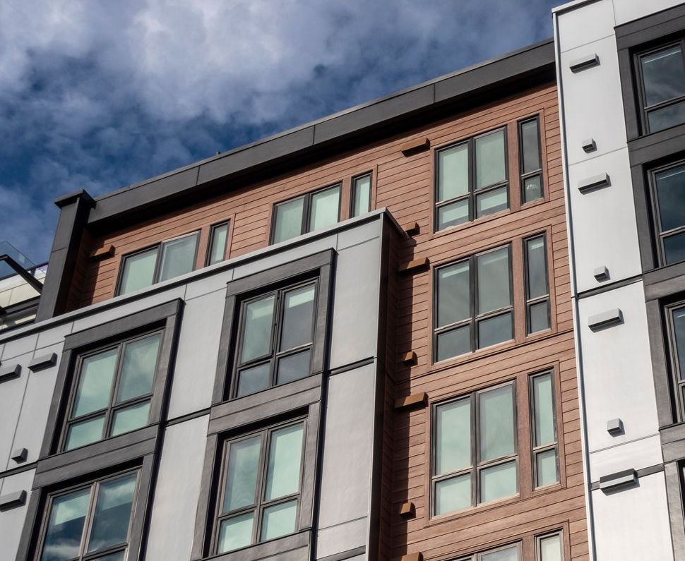 A large apartment building with a lot of windows