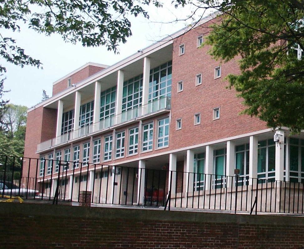 A large brick building with a lot of windows