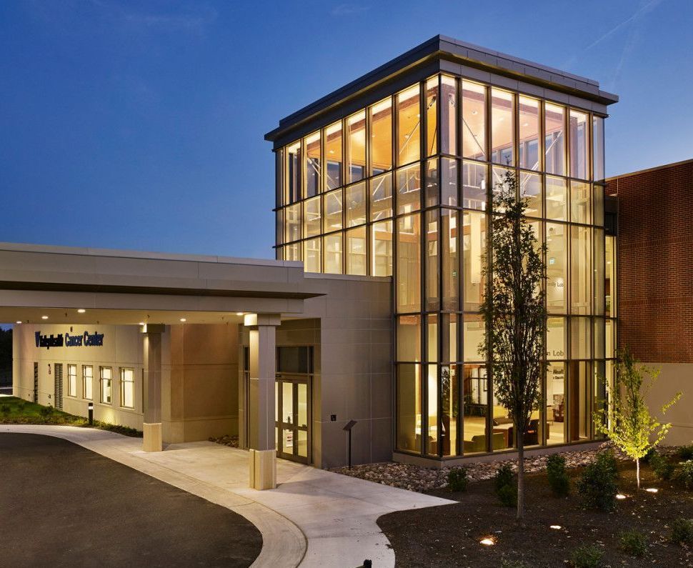 A large building with a sign that says physical therapy center