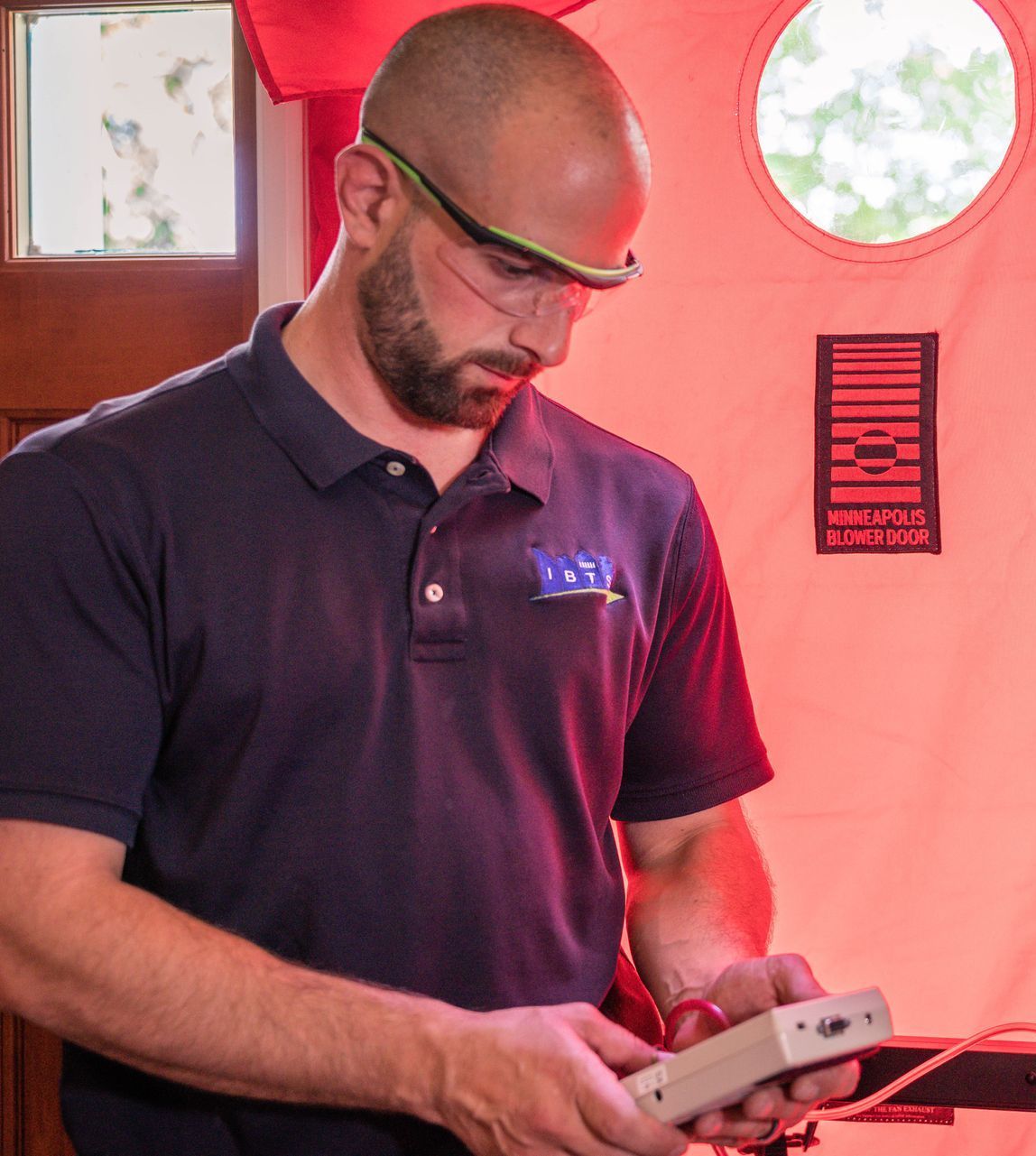 An inspector is inspecting a house.