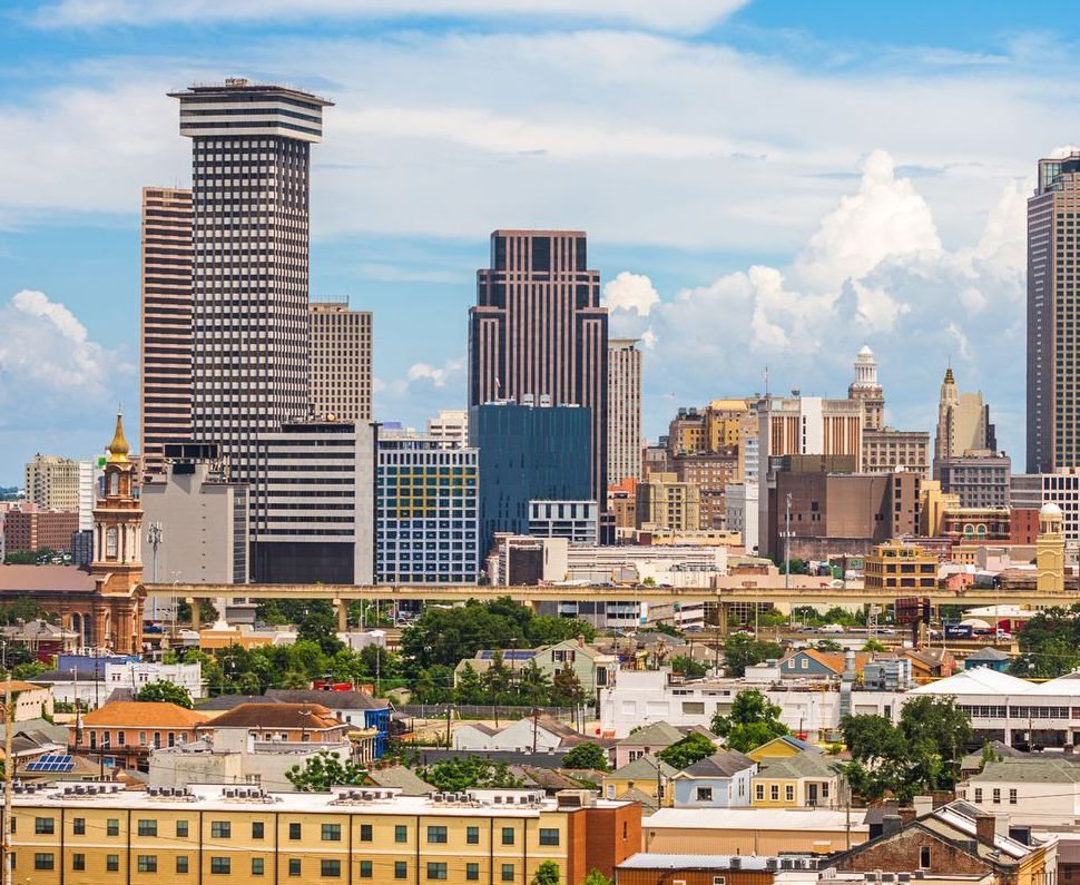 An aerial view of a city skyline with lots of tall buildings.