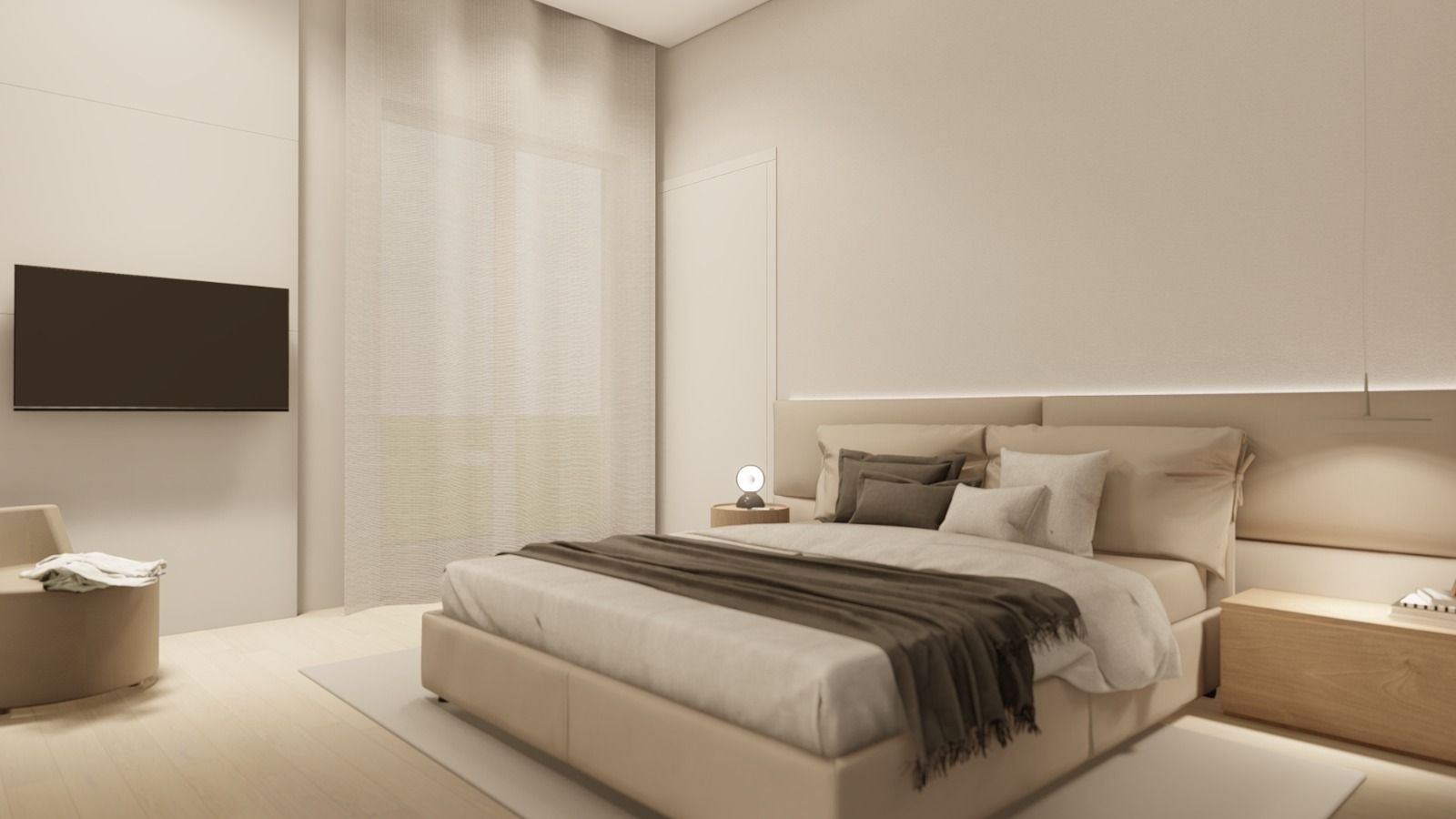 Una camera da letto con un letto grande e una tv a schermo piatto.