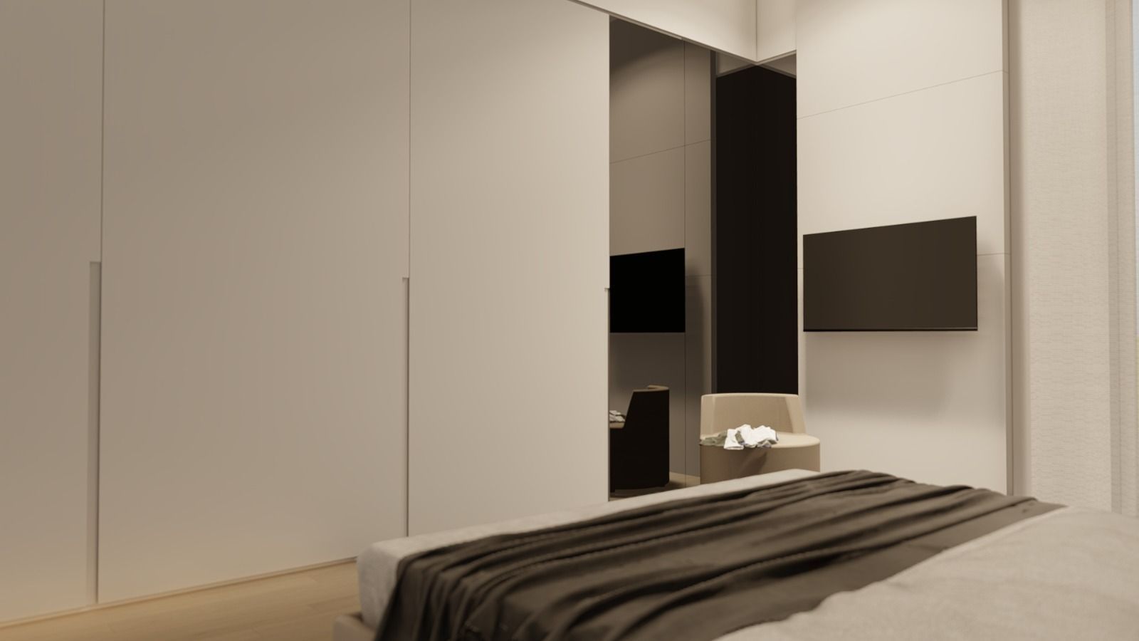 Una camera da letto con un letto, una sedia, una televisione e porte scorrevoli.