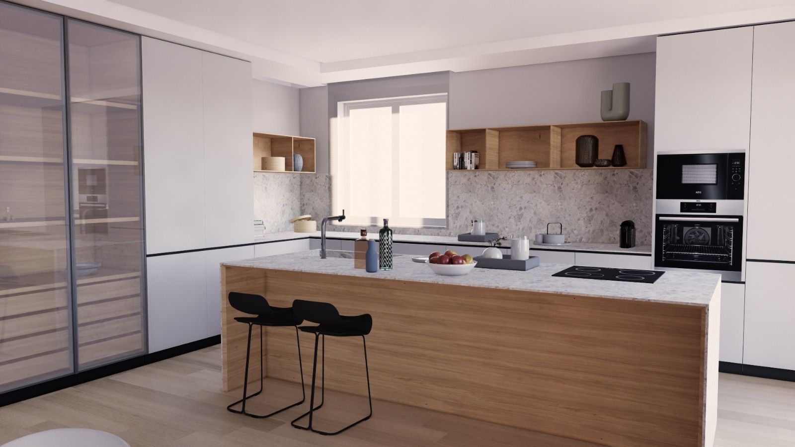 Una cucina con una grande isola al centro della stanza.