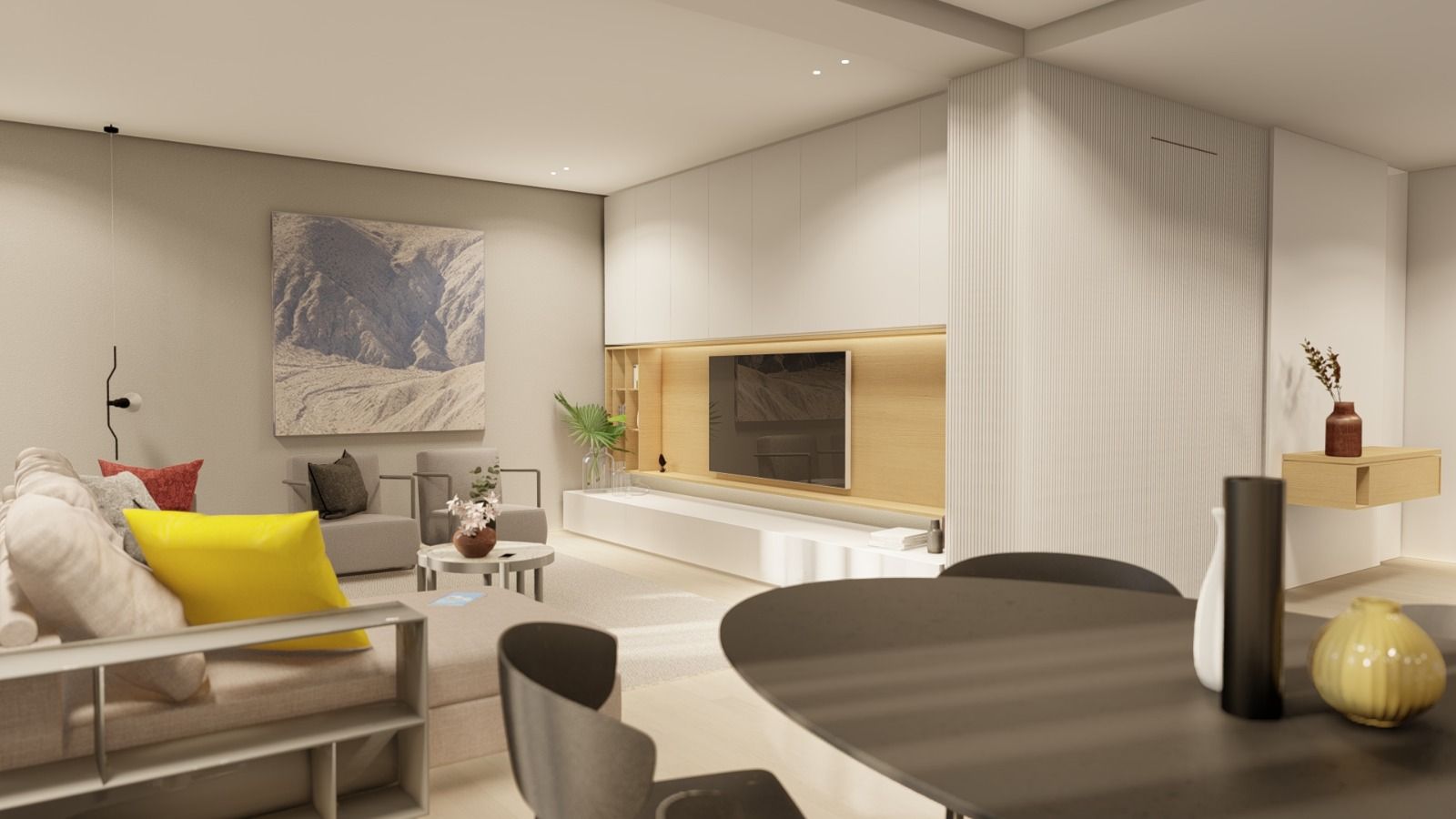 Un soggiorno con divano, tavolo, sedie e televisione.