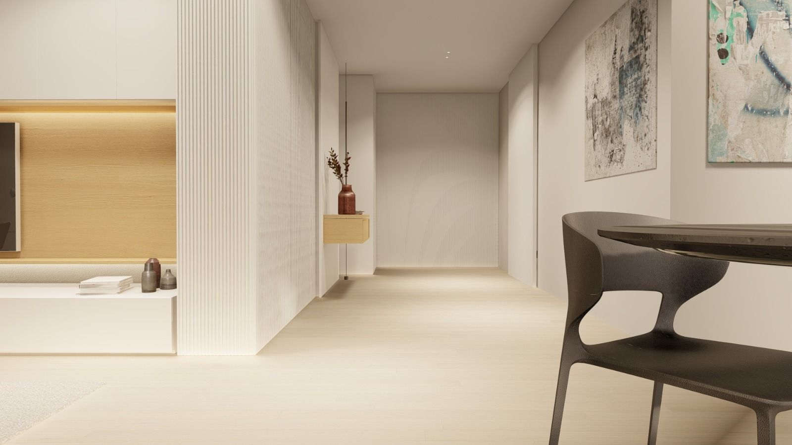 Un corridoio con un tavolo e delle sedie.