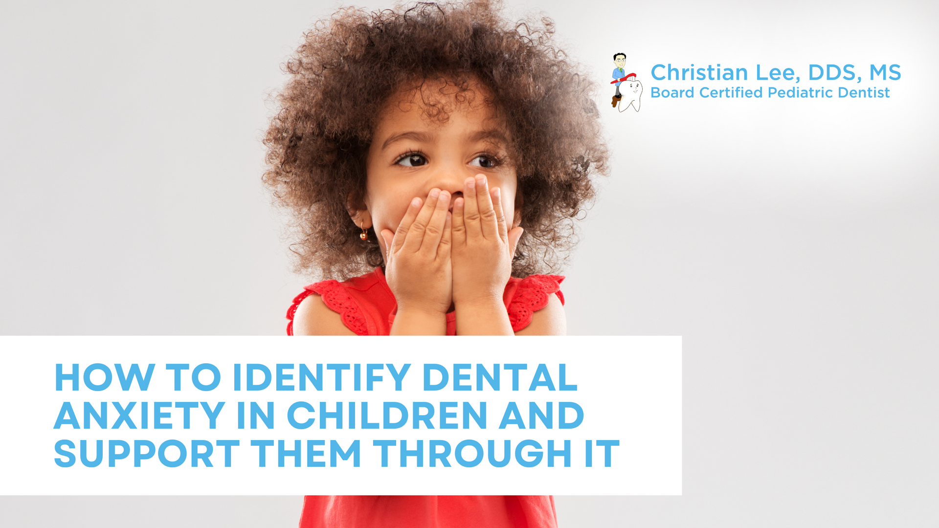 A young child with curly hair covering her mouth with hands, text reads: