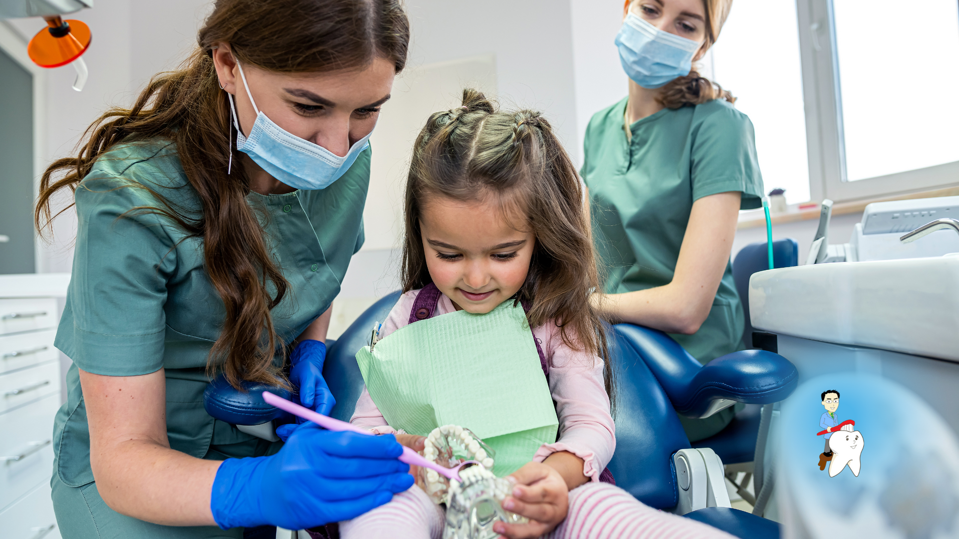 A little girl is sitting in a dental chair while a dentist examines her teeth.