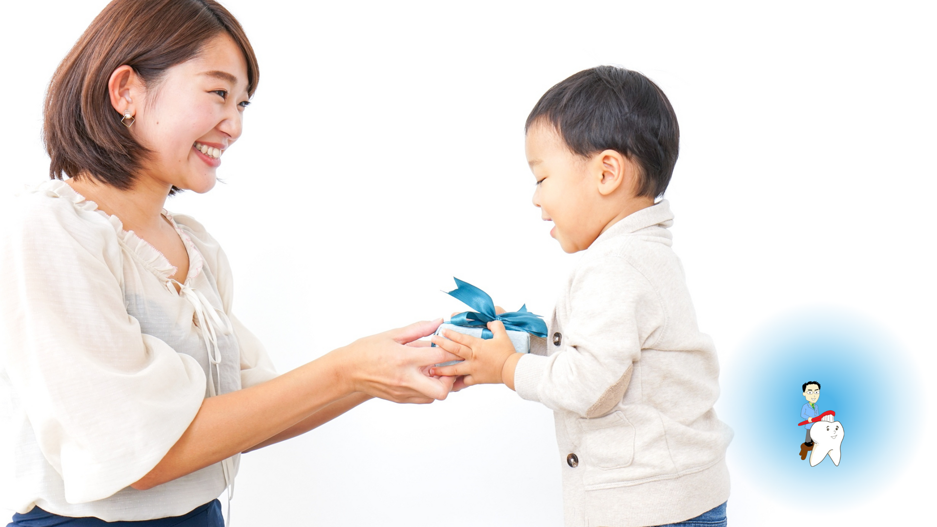A woman is giving a toy to a child.