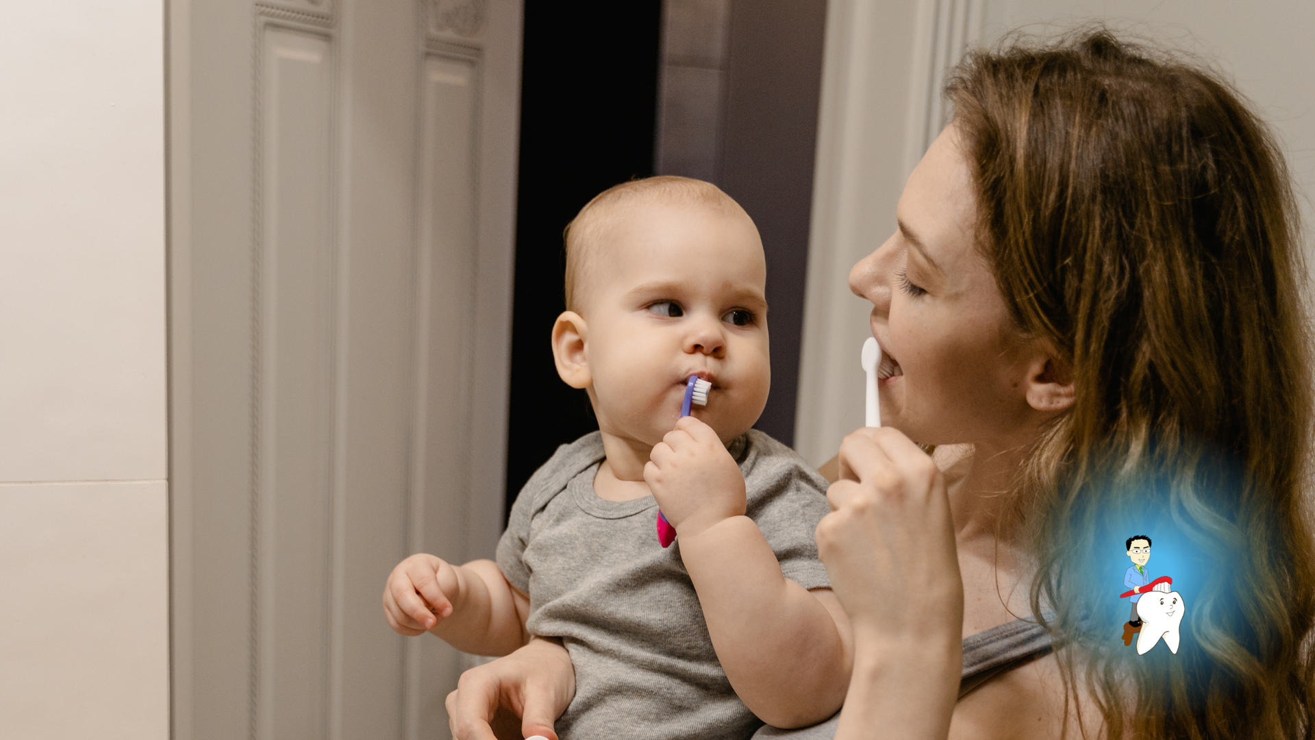 A woman is brushing her baby 's teeth in front of a mirror.