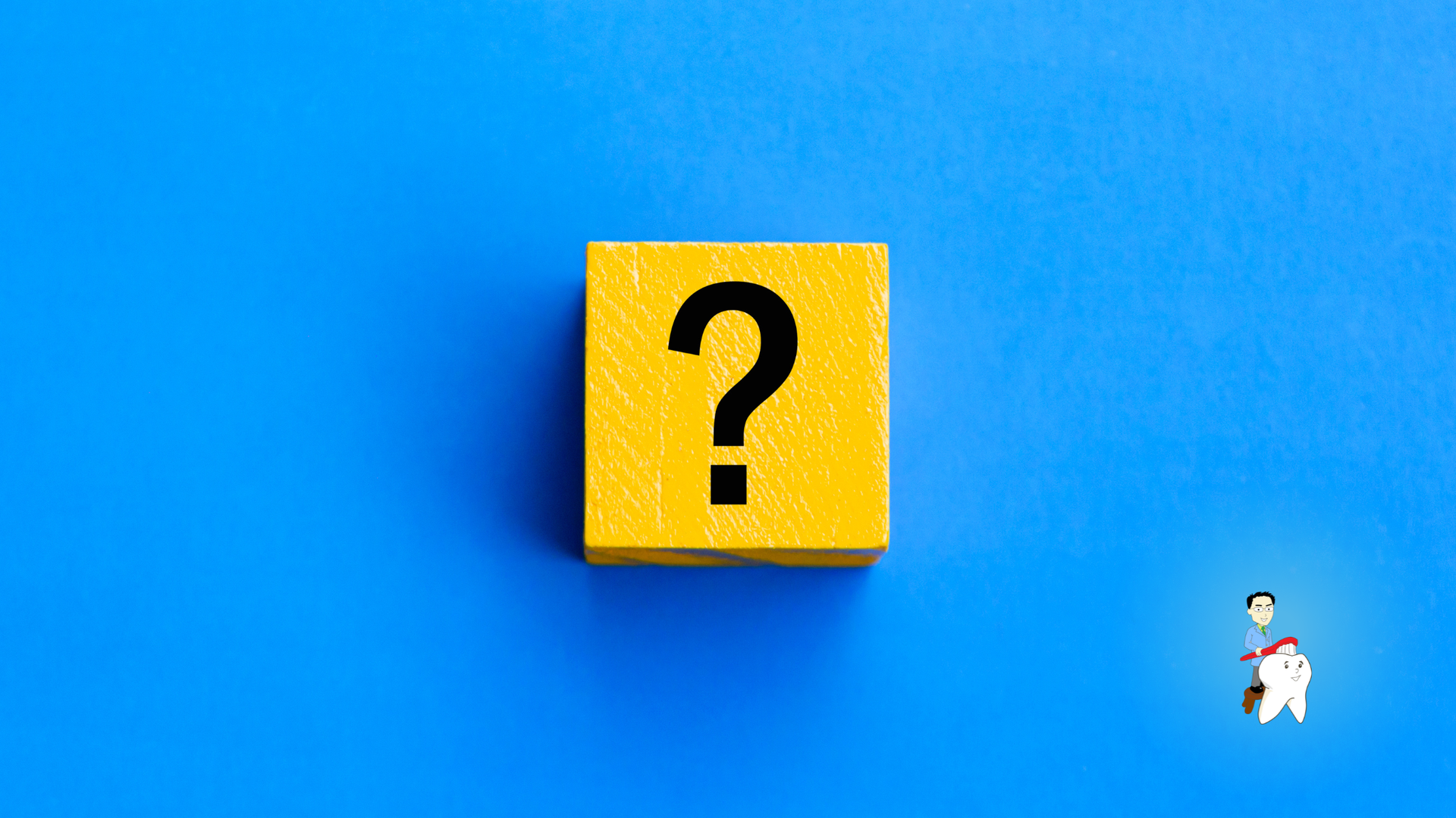 Yellow cube with black question mark on blue background.