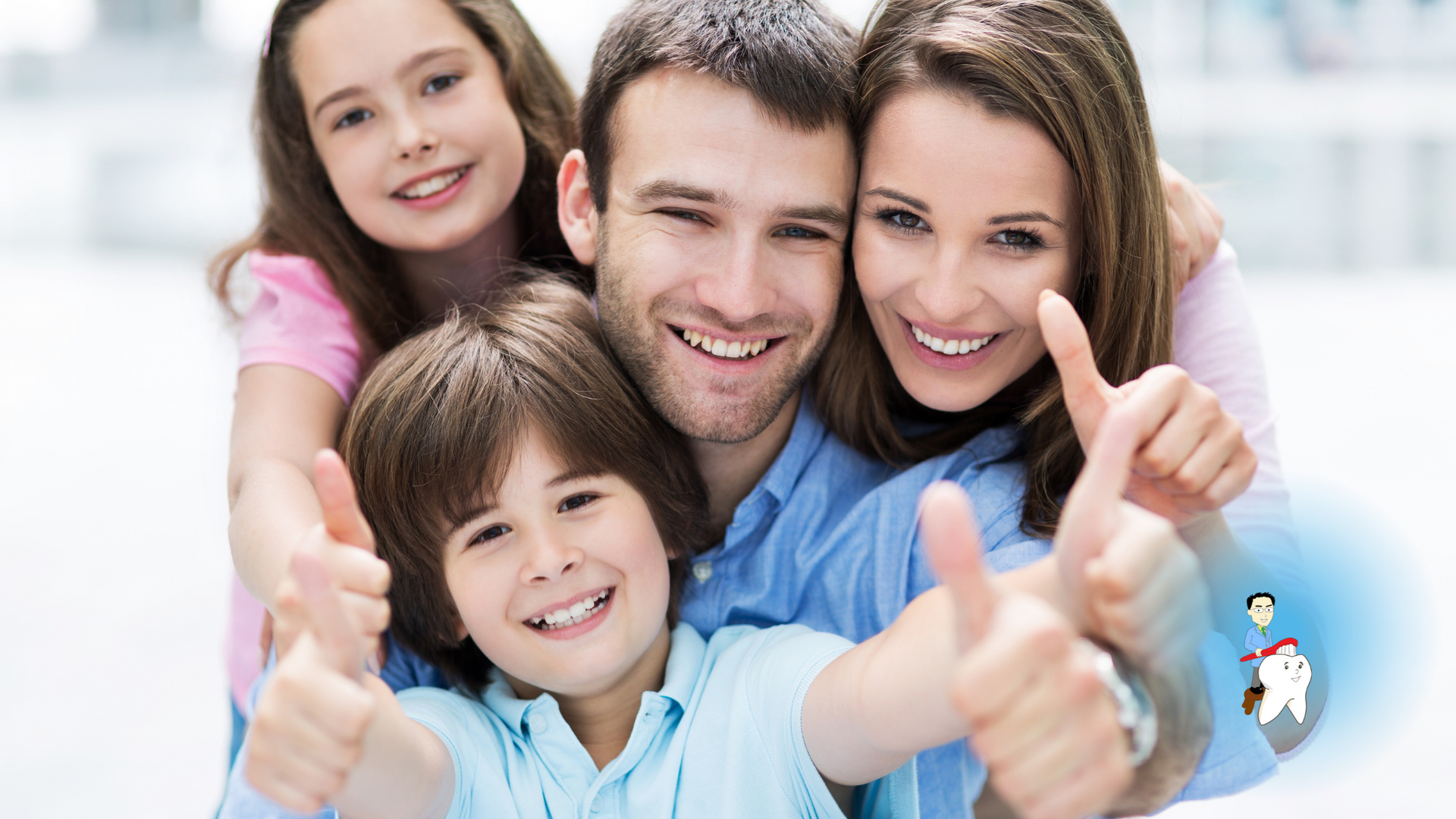 A family is posing for a picture and giving a thumbs up.