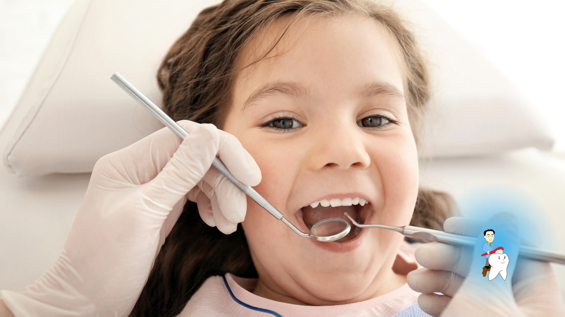 A little girl is getting her teeth examined by a dentist.