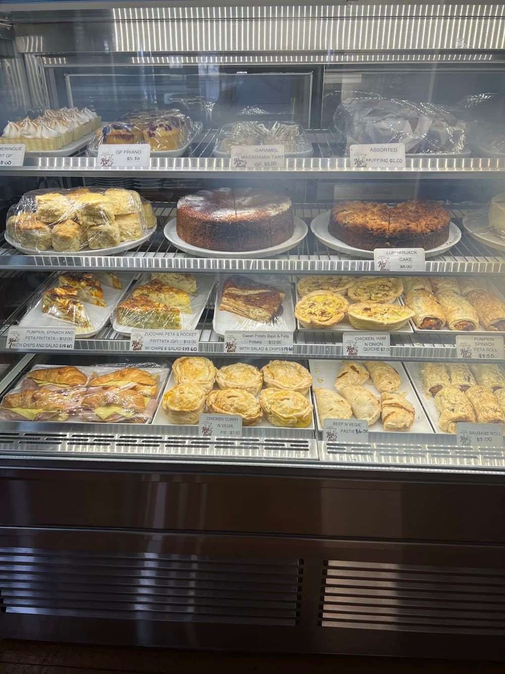 Baked Goods Displayed in Patisserie Fridge — Kapé Centro in Childers, QLD